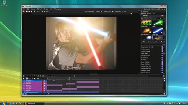 VisionLab open on Windows: a lightsaber duel held in the viewer, a browser of effects presets down the right-hand side, and a stack of coloured effect layers on the timeline below.